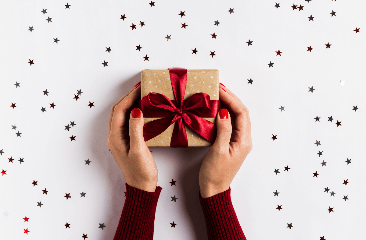 person holding a gift